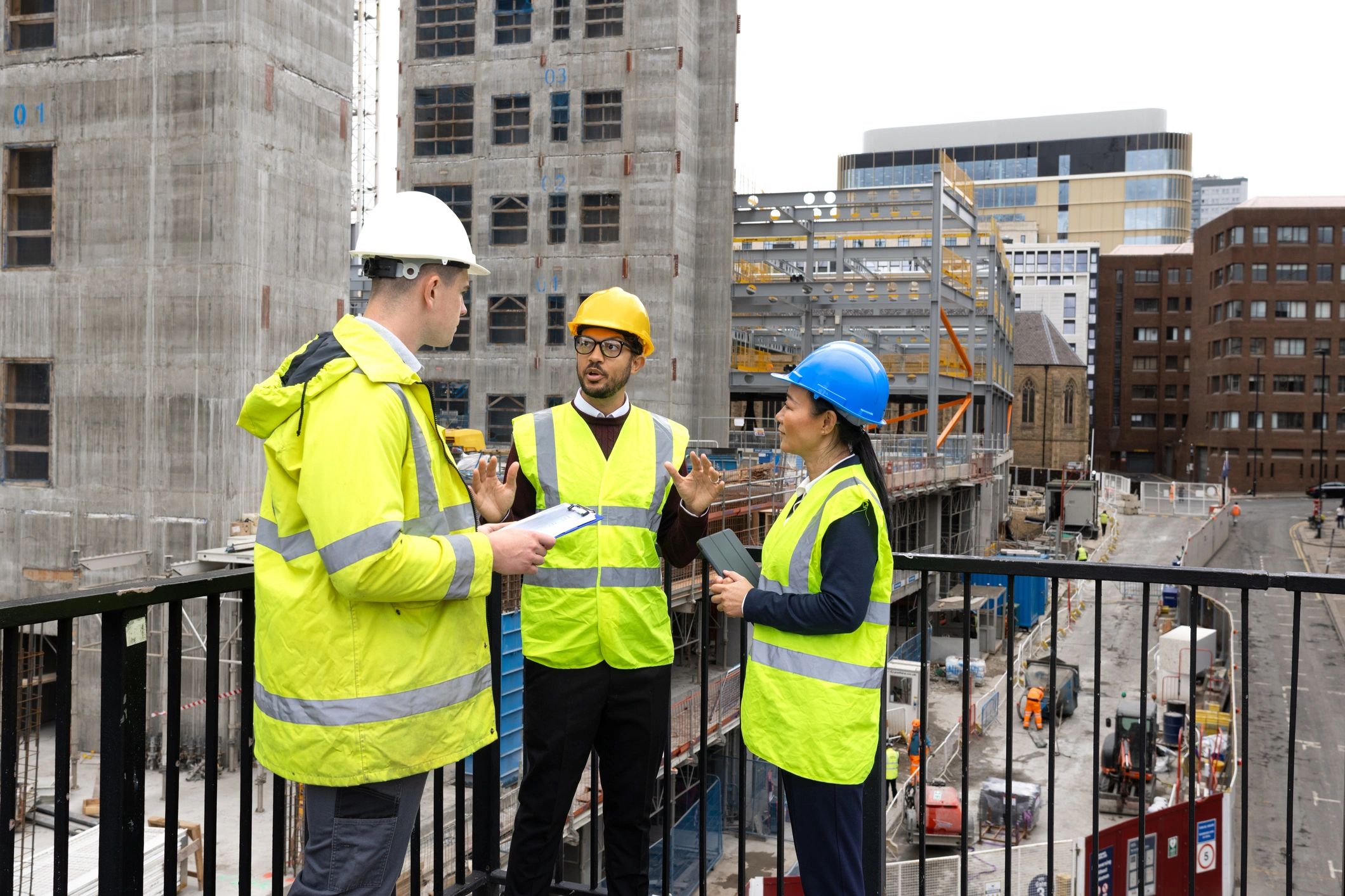 Sueiro Group LLC construction professionals reviewing plans on site